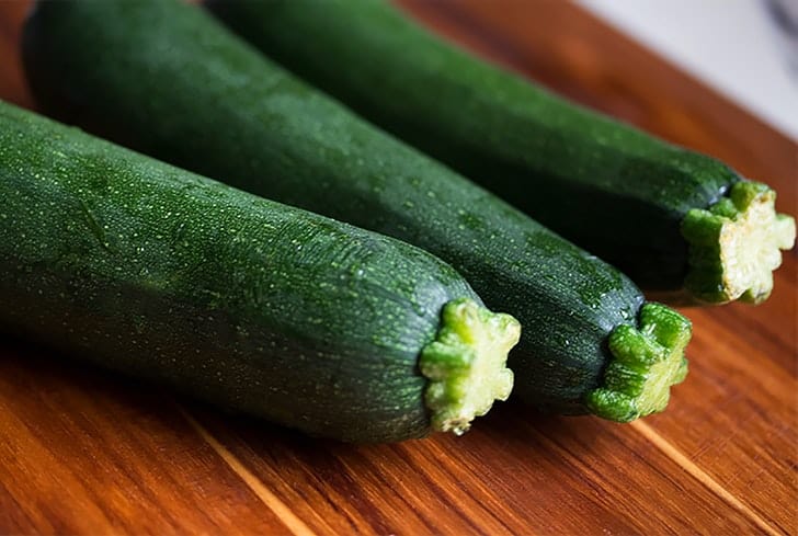 zuchini-brown-wooden-surface