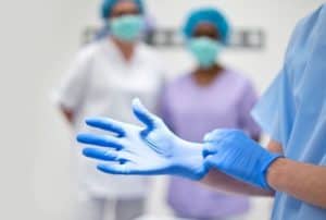 doctor-wearing-latex-gloves