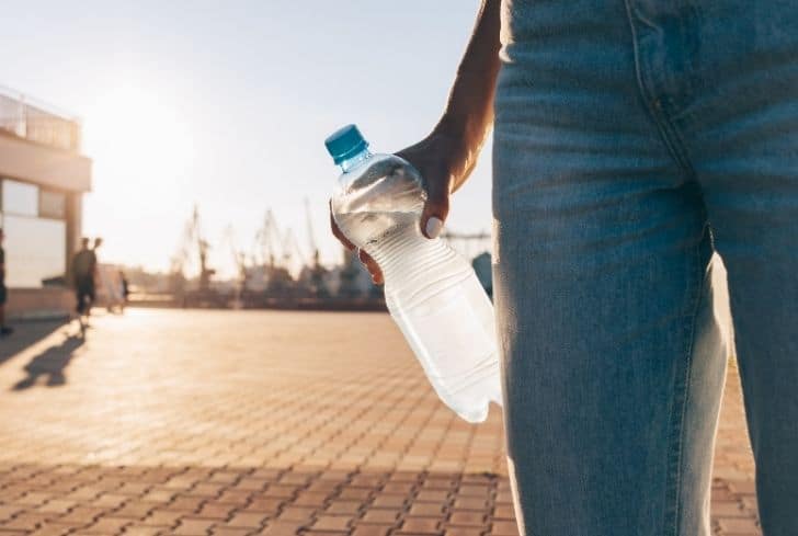 man-holding-water-bottle