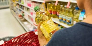 woman-holding-bottle-of-cooking-oil