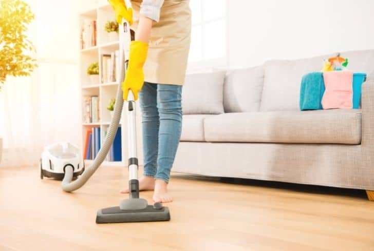 woman-using-vacuum-cleaner