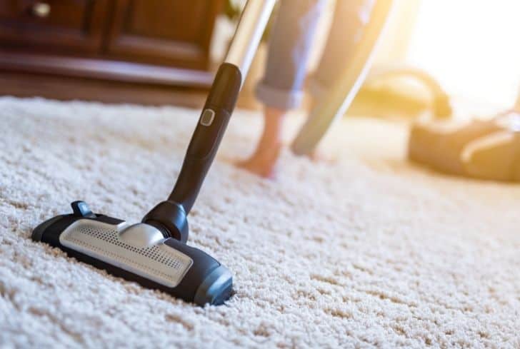 woman-using-vacuum-cleaner