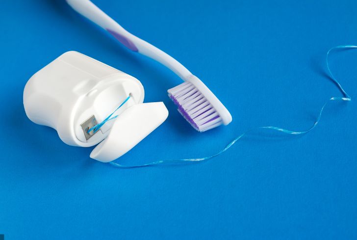 dental-floss-and-tootbrush