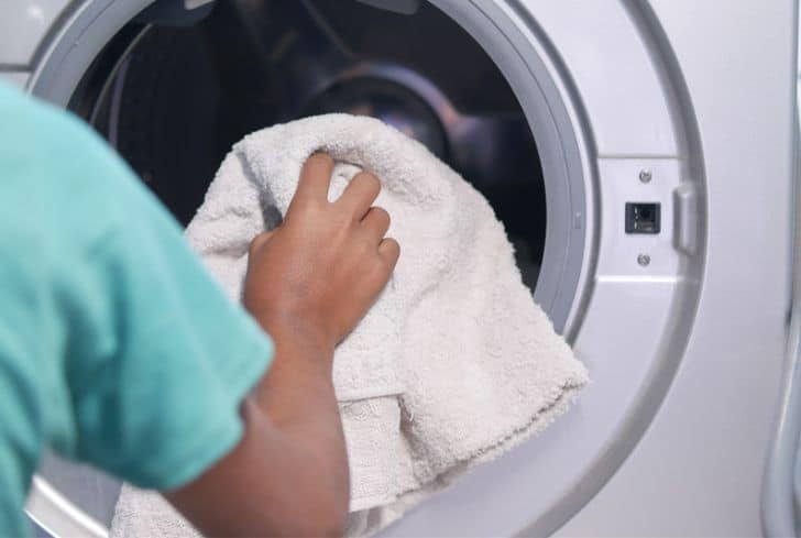 putting-towel-in-dryer